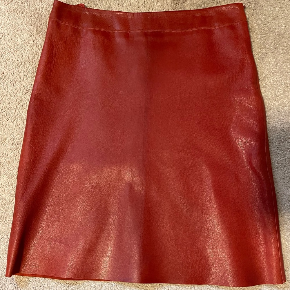 Made in Italy. Crimson red leather skirt size 10. Slightly used. No flaws.